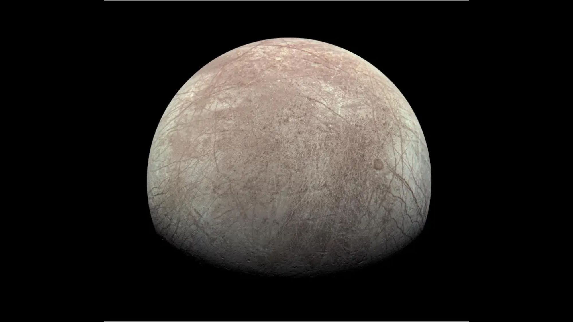 A view of a white-ish world with a subtle, large brown patch over it. There are streaks all over as well