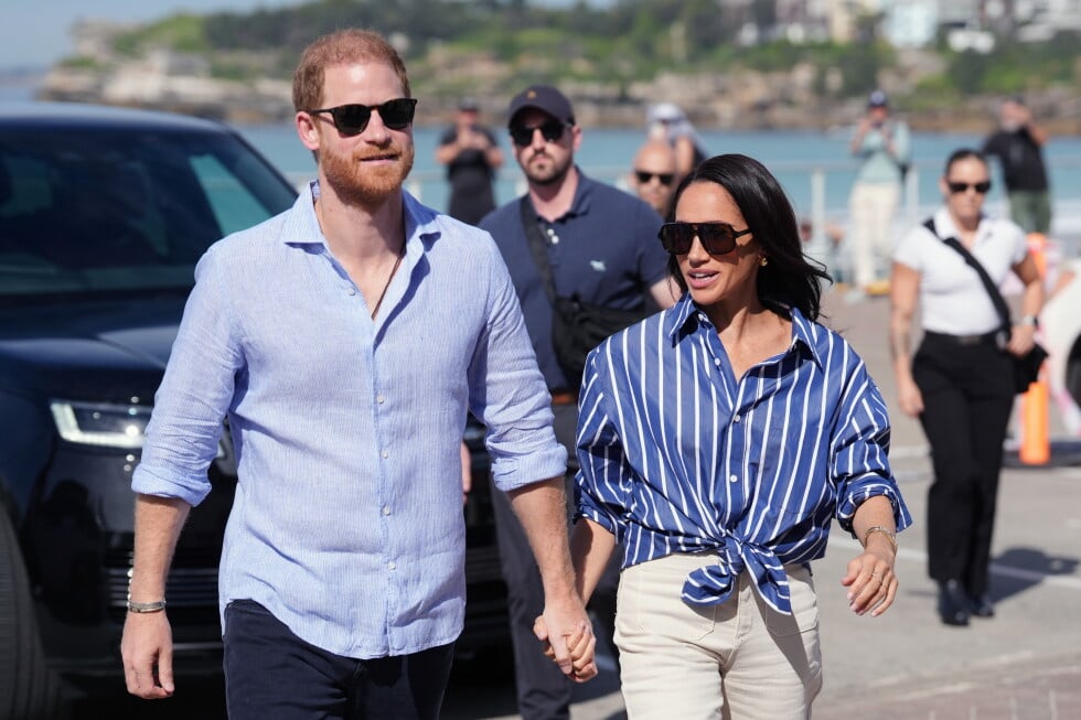 Prince Harry, and Meghan, the Duke and Duchess of Sussex, arrive for an event, during a visit to Bondi Beach, Australia